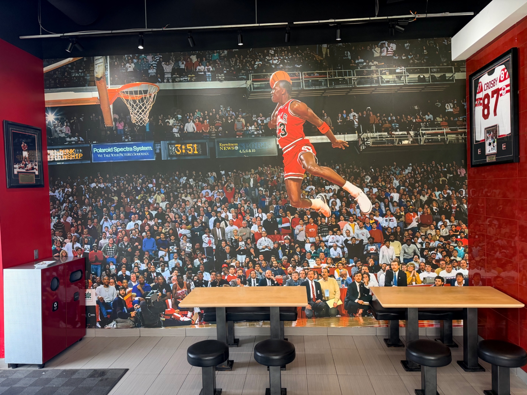 Hall of Flame dining area with the Michael Jordan slam dunk mural